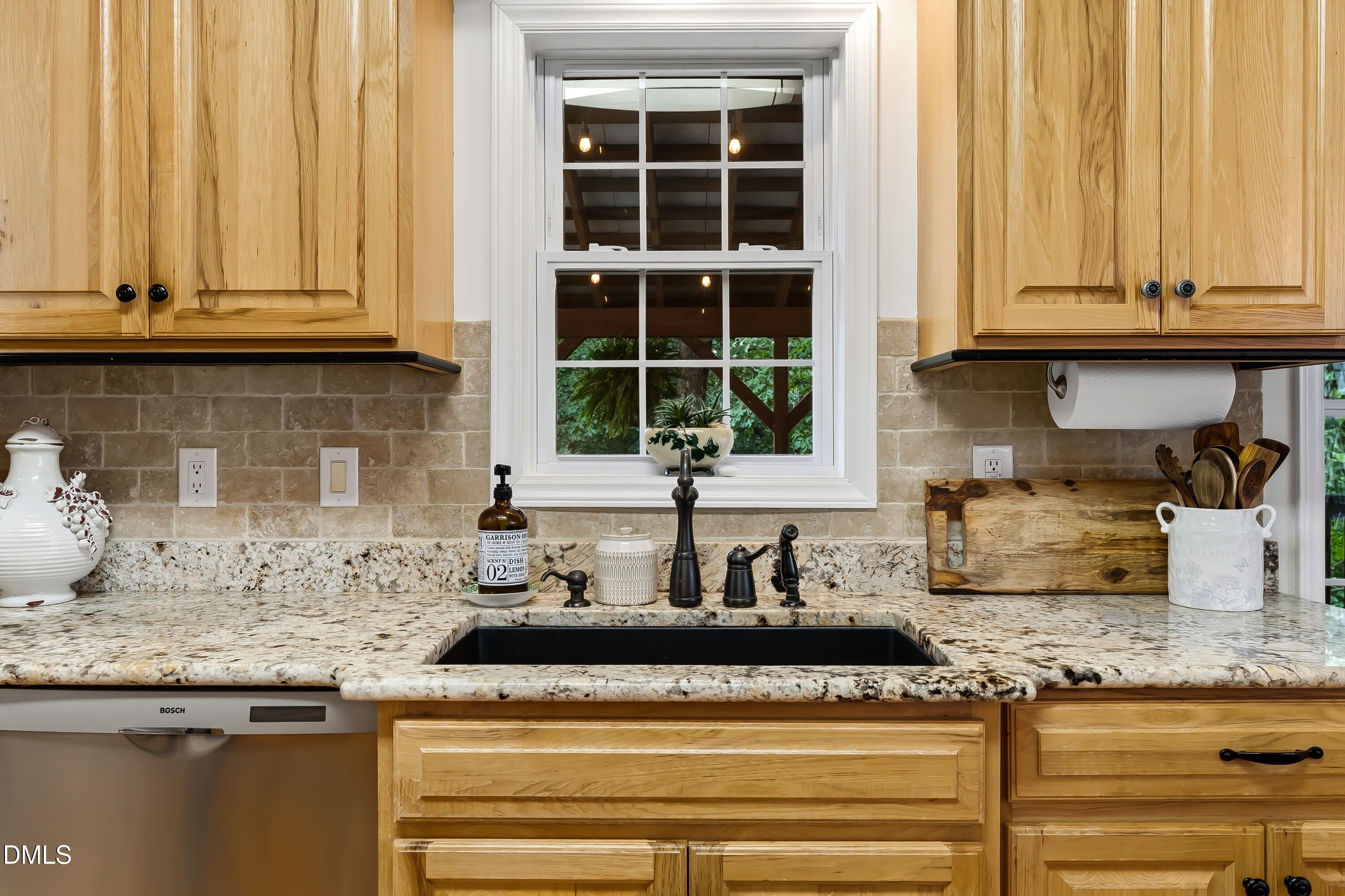 1214 Halcyon Place Rougemont, NC 27572 - Photo 25 of 69 a kitchen with granite countertop cabinets and window