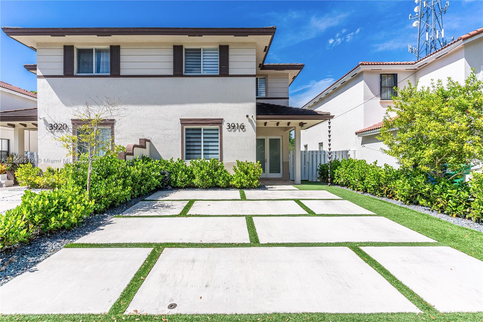 3916 Southwest 69th Avenue Miami, FL 33155 - Photo 1 of 7 a view of a house with a garden