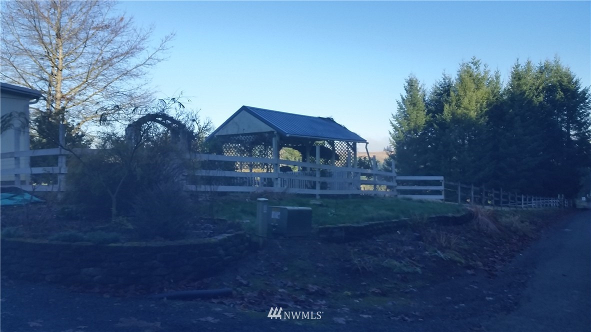224 Wirta Road Winlock, WA 98596 - Photo 21 of 22 a front view of a house with yard and green space