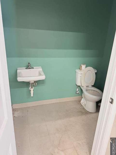 1339 Jones Chapel Road Sparta, GA 31087 - Photo 2 of 14 a bathroom with a toilet and a sink