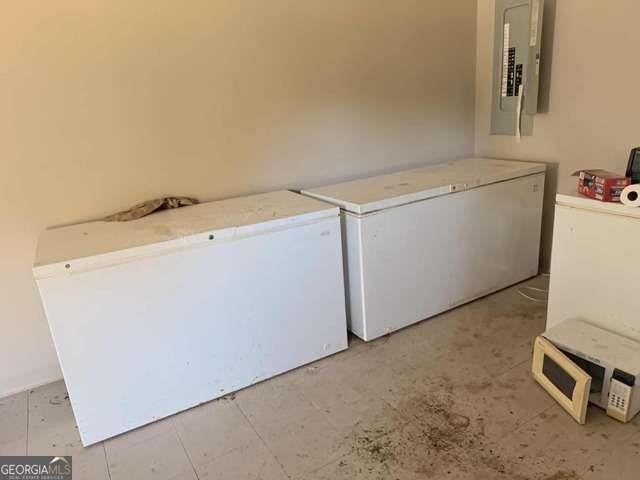 1339 Jones Chapel Road Sparta, GA 31087 - Photo 8 of 14 a utility room with dryer and washer