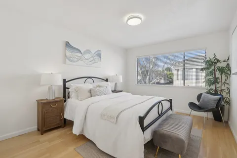 a bathroom with a sink vanity and mirror
