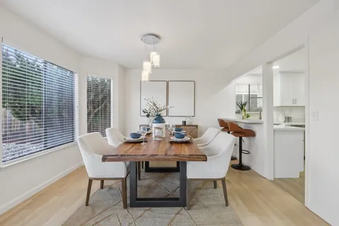 a view of a dining room with furniture