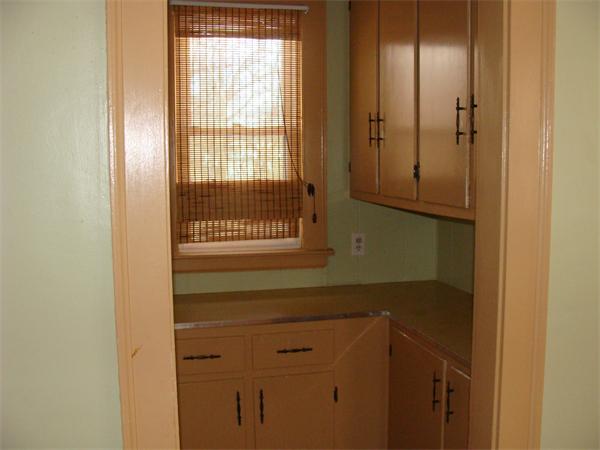19 Strong Street Springfield, MA 01104 - Photo 4 of 11 a bathroom with a sink and a mirror