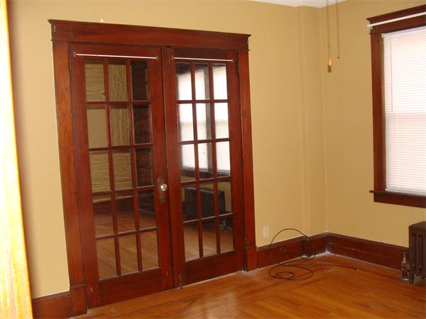 19 Strong Street Springfield, MA 01104 - Photo 6 of 11 a bedroom with a bed and a window