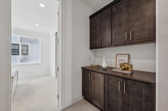 a kitchen with a sink and cabinets
