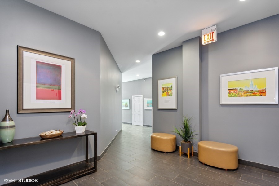 2408 West Rice Street, Unit 403 Chicago, IL 60622 - Photo 2 of 19 a living room with furniture and a couch