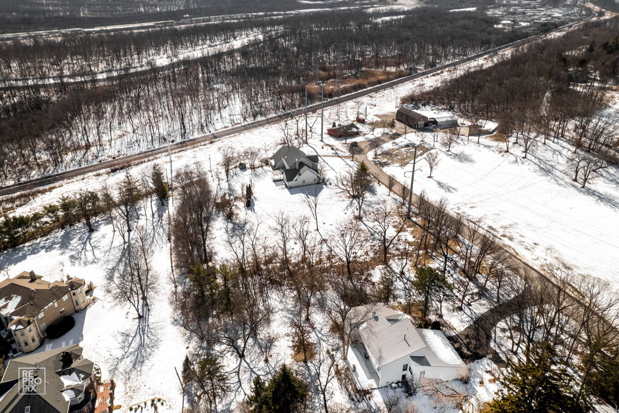 10S641 South Garfield Street Burr Ridge, IL 60527 - Photo 2 of 15 a view of swimming pool from a balcony