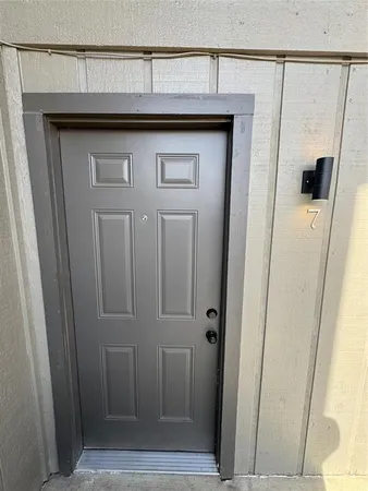 a bathroom with a shower and vanity