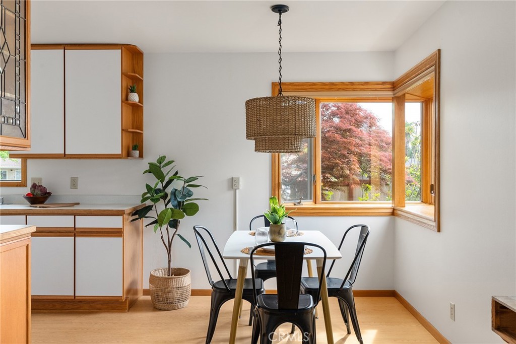 12 Amber Way Chico, CA 95926 - Photo 11 of 37 a view of a dining room with furniture window and wooden floor