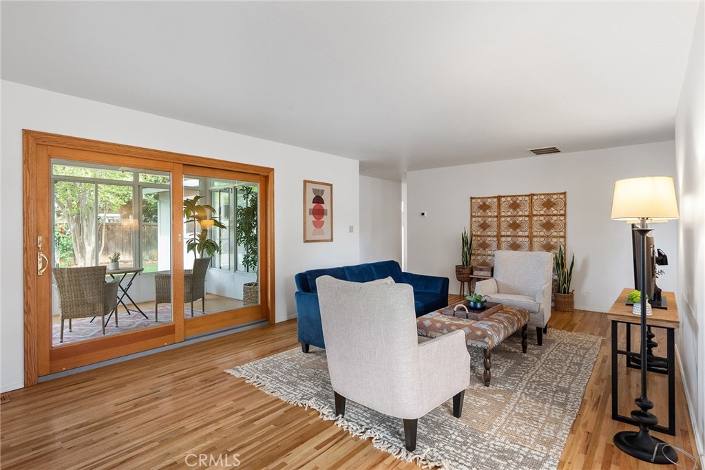 12 Amber Way Chico, CA 95926 - Photo 13 of 37 a living room with furniture and a floor to ceiling window