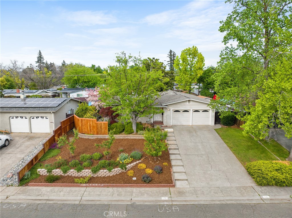 12 Amber Way Chico, CA 95926 - Photo 2 of 37 front view of a house with a yard and trees in the background