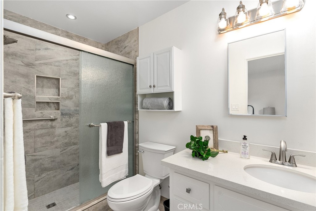 12 Amber Way Chico, CA 95926 - Photo 22 of 37 a bathroom with a sink a toilet and shower