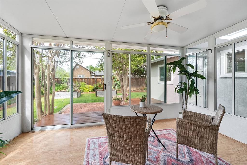 12 Amber Way Chico, CA 95926 - Photo 26 of 37 a dining room with furniture a chandelier and glass door