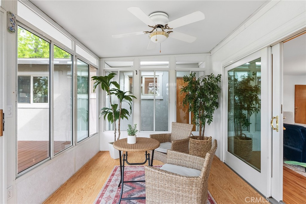 12 Amber Way Chico, CA 95926 - Photo 27 of 37 a living room with furniture a large window and a chandelier
