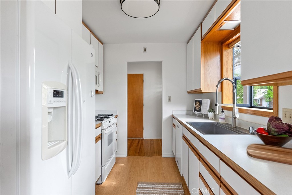 12 Amber Way Chico, CA 95926 - Photo 8 of 37 a bathroom with a granite countertop sink and a window