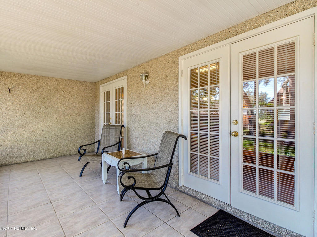 144 Tanager Road St. Augustine, FL 32086 - Photo 23 of 46 a view of a room with windows