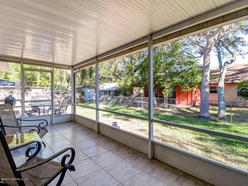 144 Tanager Road St. Augustine, FL 32086 - Photo 24 of 46 a room with furniture and a view of outdoor space