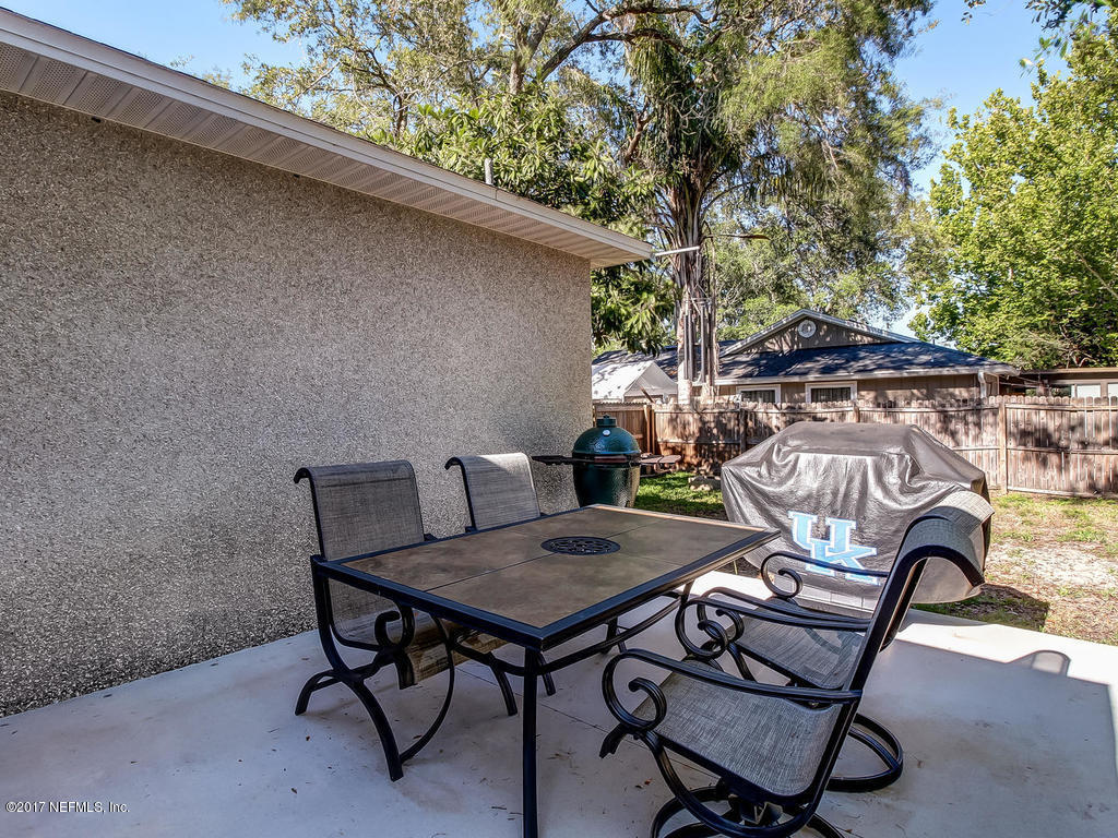 144 Tanager Road St. Augustine, FL 32086 - Photo 25 of 46 a view of a chairs and table in patio