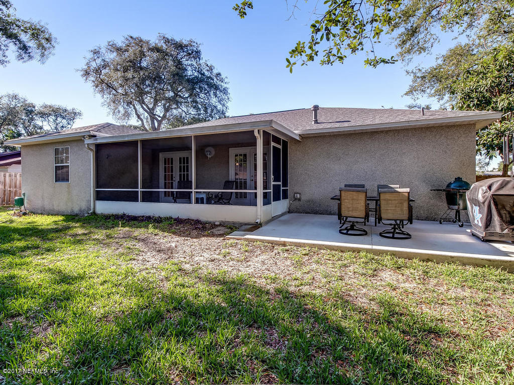 144 Tanager Road St. Augustine, FL 32086 - Photo 26 of 46 a house view with a garden space