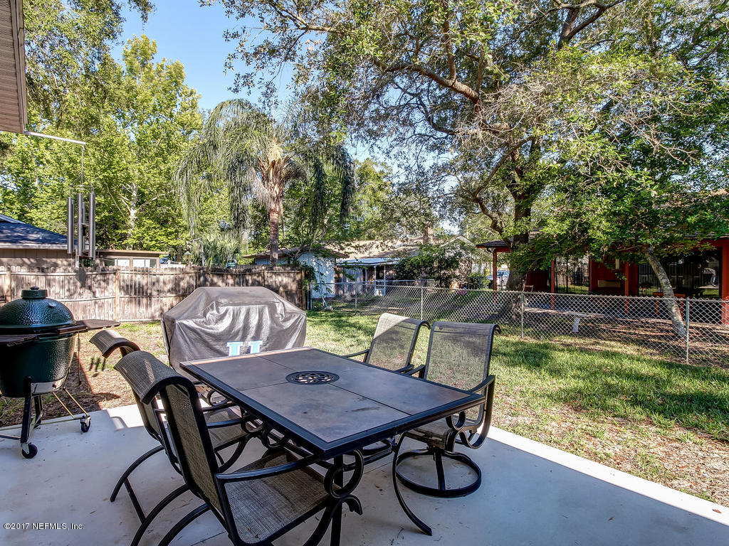 144 Tanager Road St. Augustine, FL 32086 - Photo 27 of 46 a view of a chairs and table in the patio