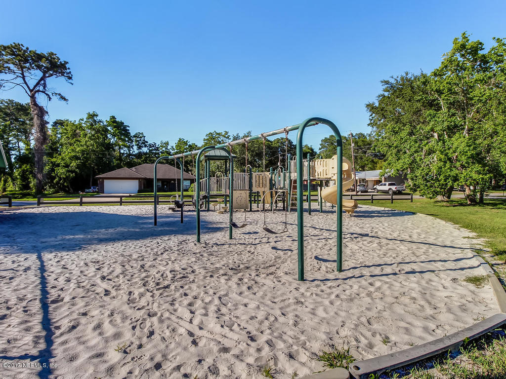 144 Tanager Road St. Augustine, FL 32086 - Photo 33 of 46 a view of a park with welcome board