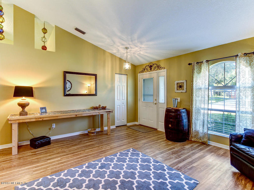 144 Tanager Road St. Augustine, FL 32086 - Photo 10 of 46 a living room with furniture