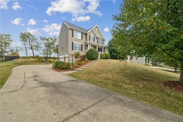 a view of balcony with wooden floor and fence