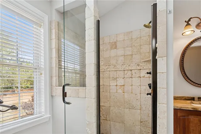 a bathroom with a sink and cabinets