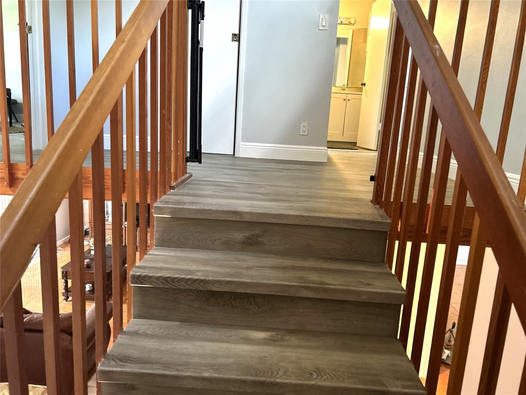 7680 Northwest 79th Avenue, Unit P1 Tamarac, FL 33321 - Photo 14 of 28 a view of staircase with railing and a stairs