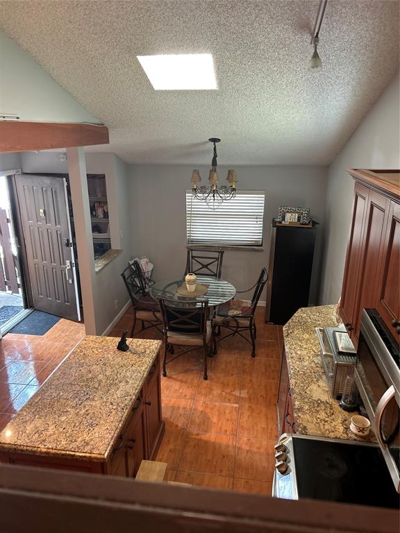 7680 Northwest 79th Avenue, Unit P1 Tamarac, FL 33321 - Photo 3 of 28 a living room with furniture and a wooden floor