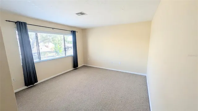 a view of a house with swimming pool