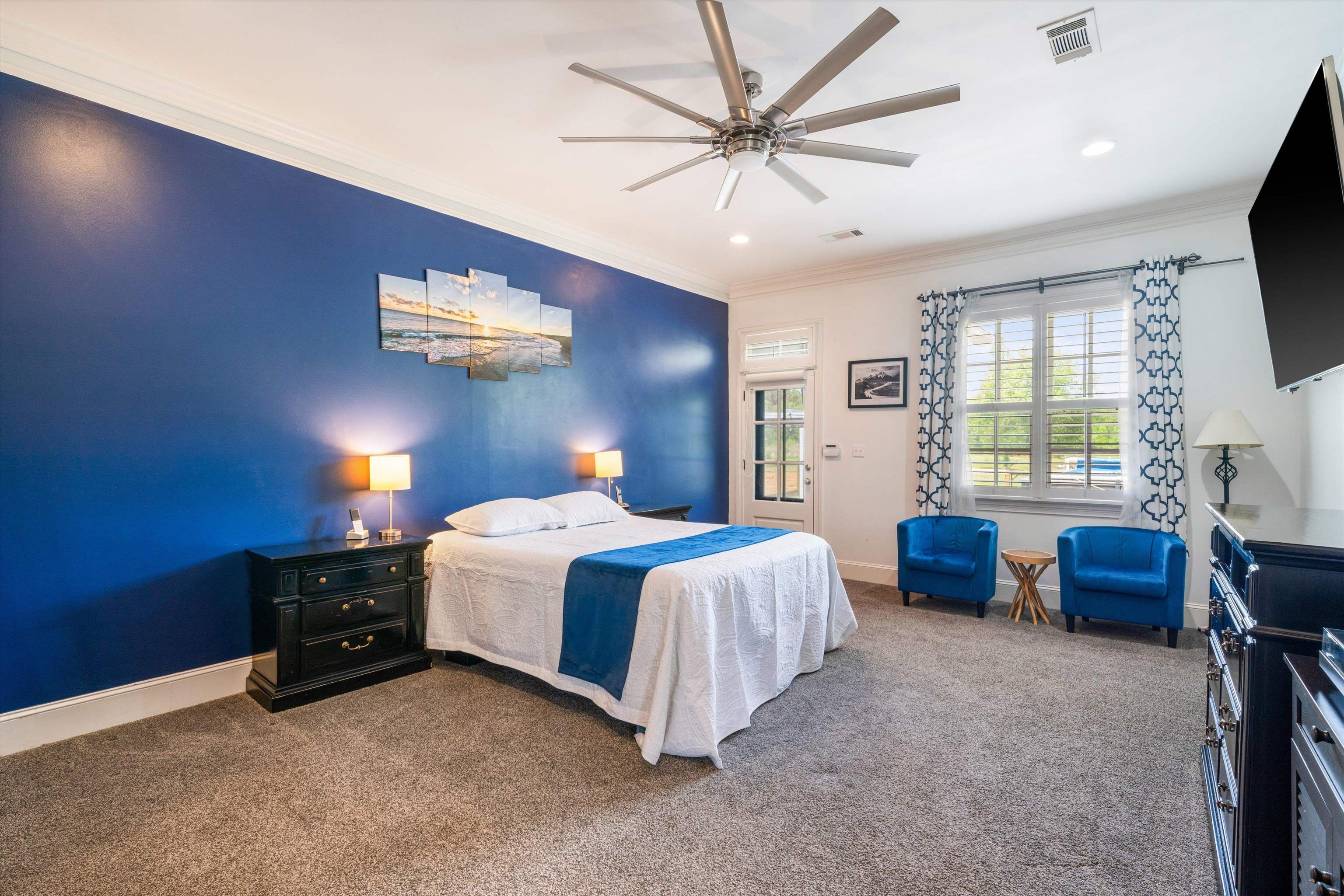11300 Long Road Arlington, TN 38002 - Photo 14 of 39 a spacious bedroom with a bed and a tv