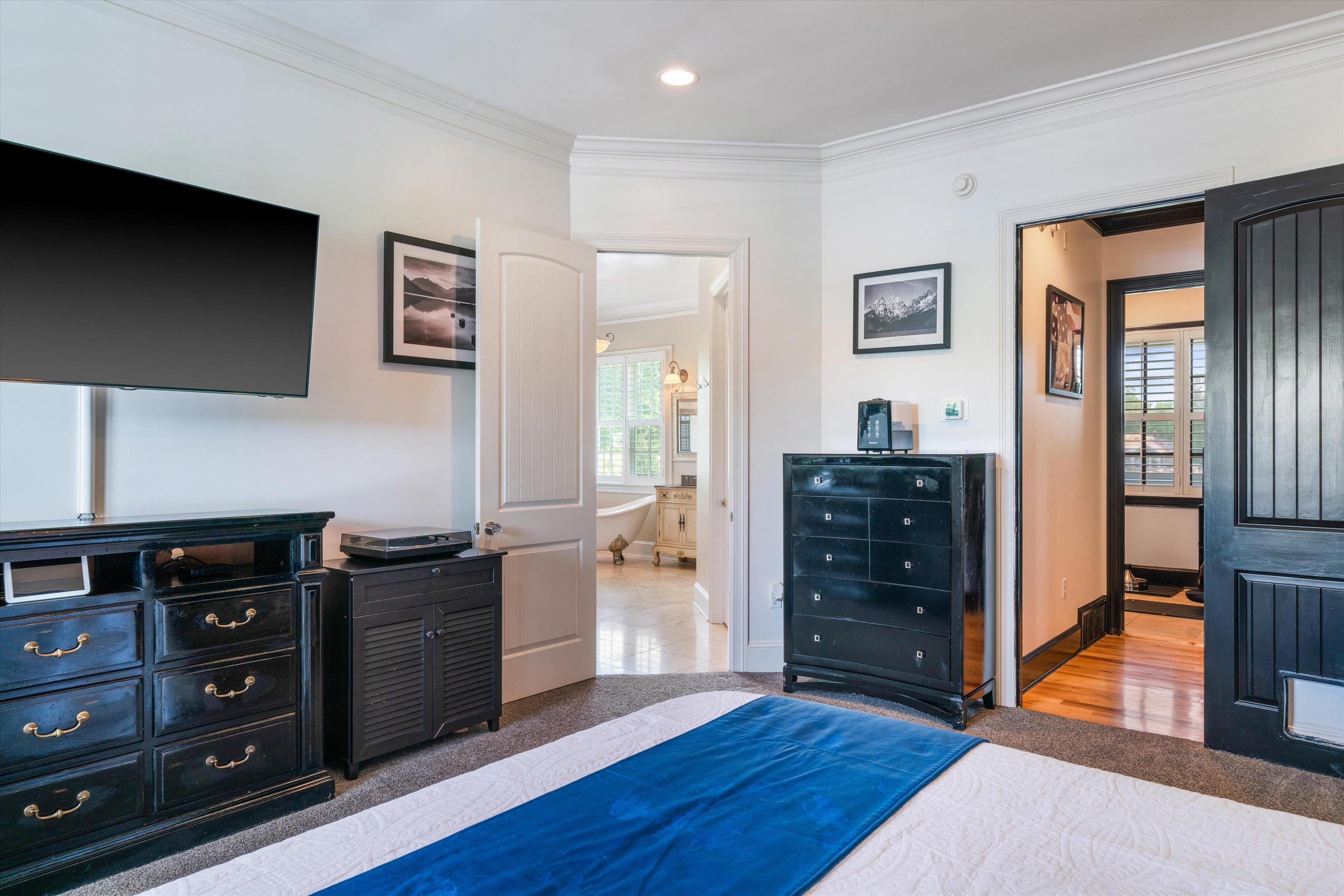 11300 Long Road Arlington, TN 38002 - Photo 15 of 39 a view of a bedroom with wooden floor and cabinet
