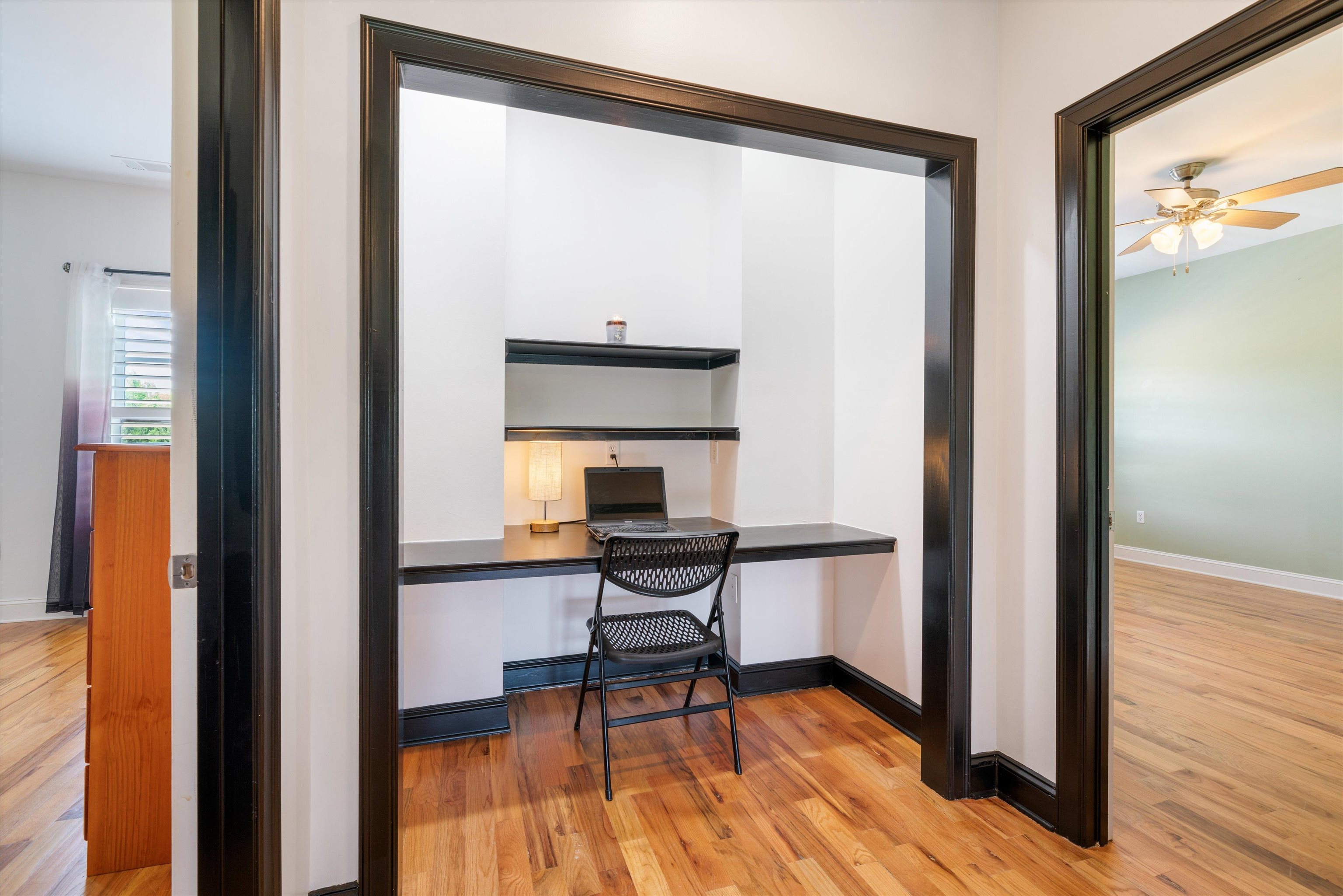 11300 Long Road Arlington, TN 38002 - Photo 25 of 39 a view of a workspace with wooden floor and a window