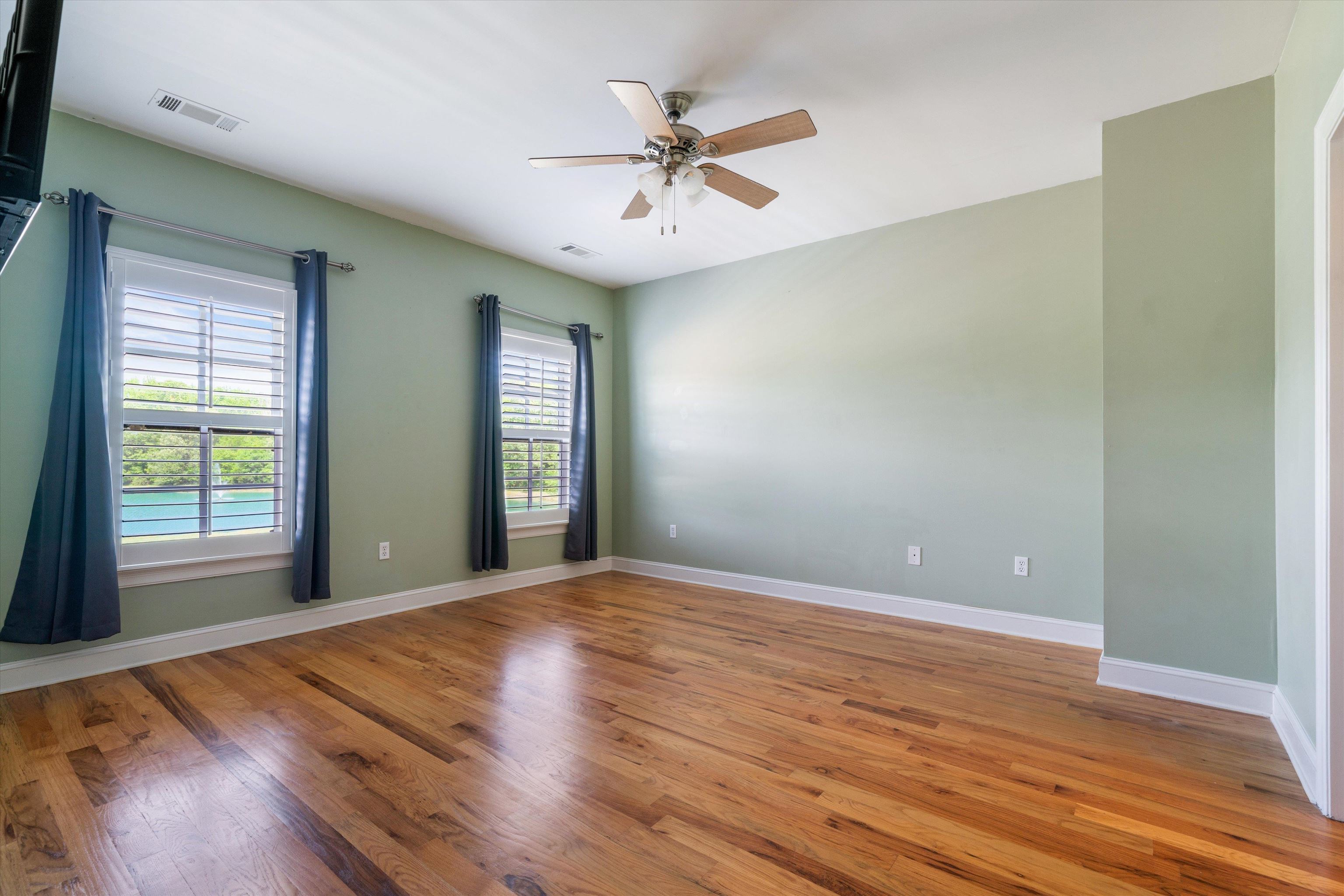 11300 Long Road Arlington, TN 38002 - Photo 26 of 39 wooden floor in an empty room with a window
