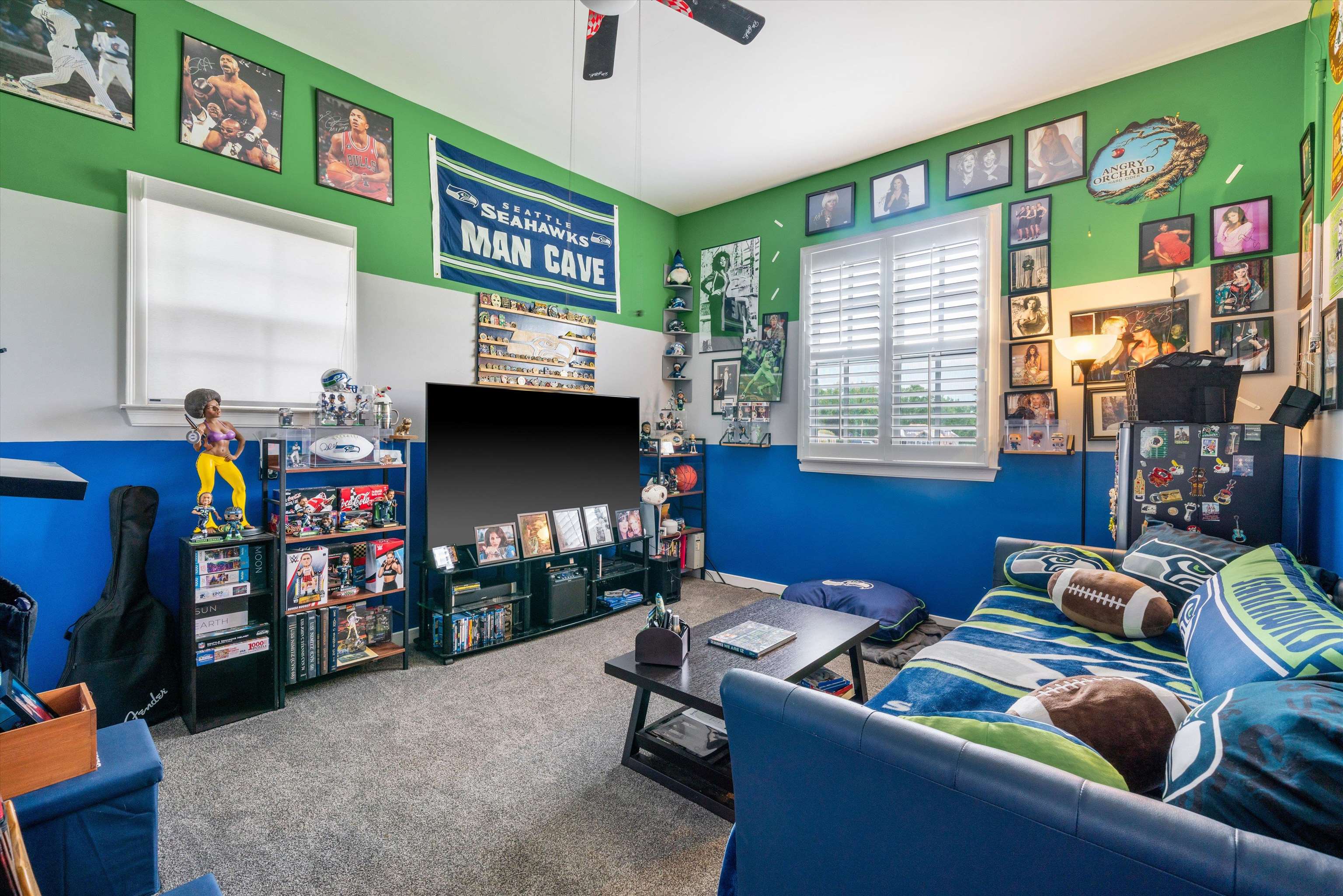 11300 Long Road Arlington, TN 38002 - Photo 33 of 39 a living room with furniture a window and bookshelf