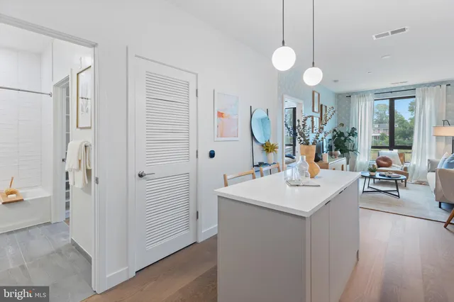 a view of living room with furniture and window