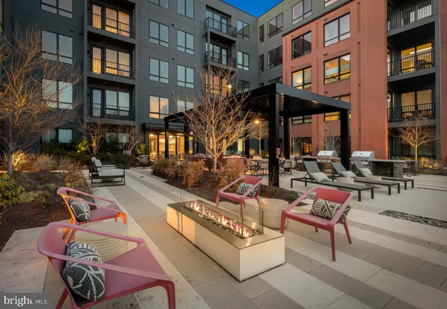 a view of pool with outdoor seating
