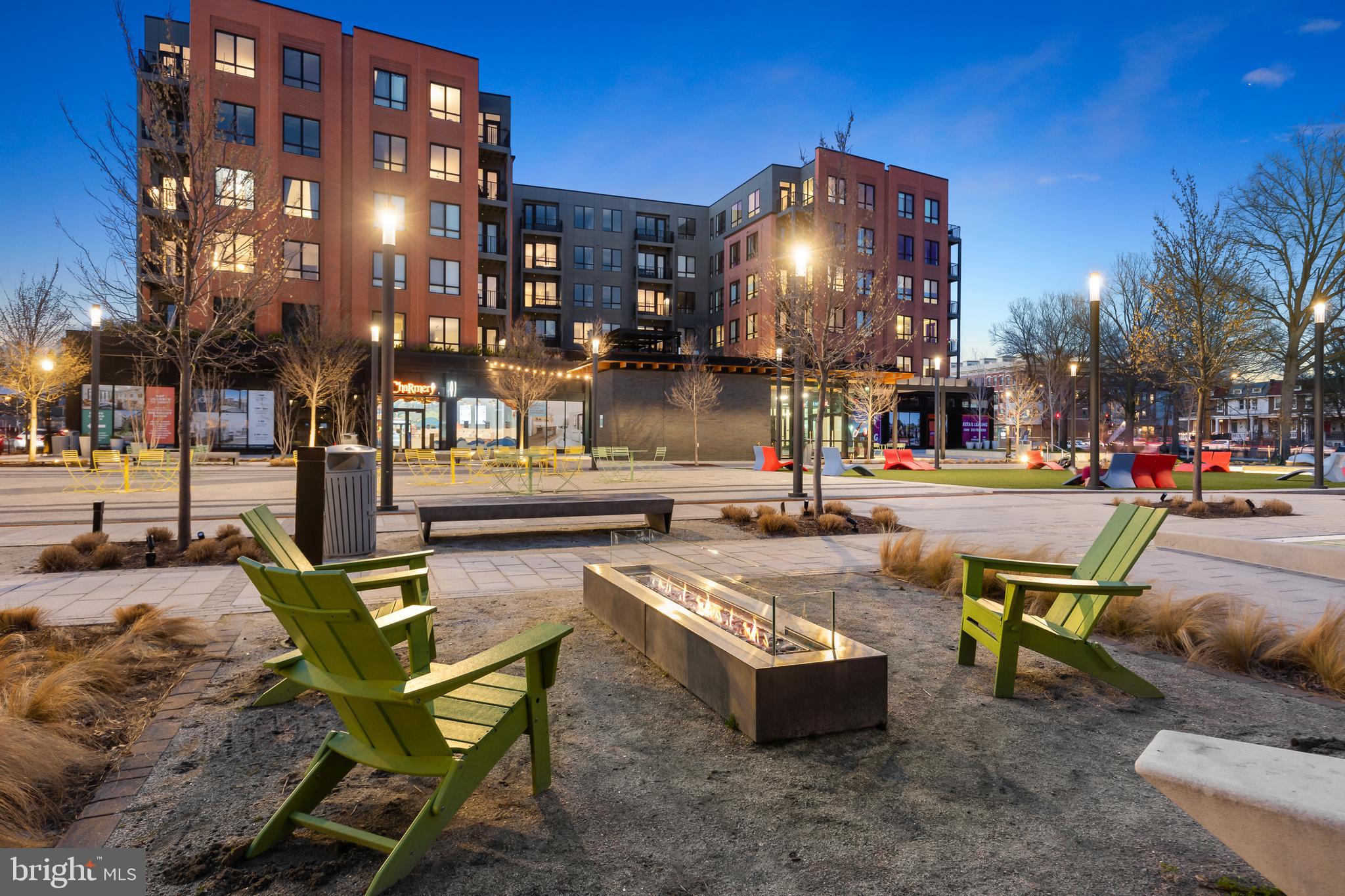 7175 12th Street Northwest, Unit 411 Washington, DC 20012 - Photo 31 of 46 a view of a swimming pool with outdoor seating
