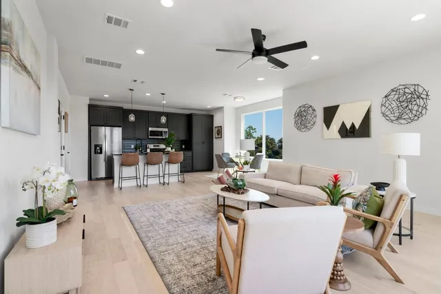 a workspace with furniture and wooden floor