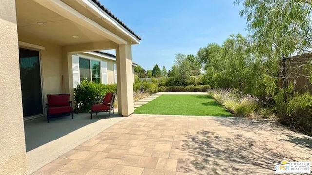 a view of a backyard with a garden