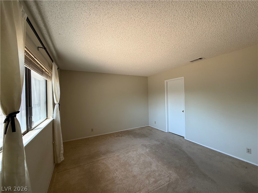 6491 West Viking Road Las Vegas, NV 89103 - Photo 11 of 20 Primary Bedroom with en-suite bathroom