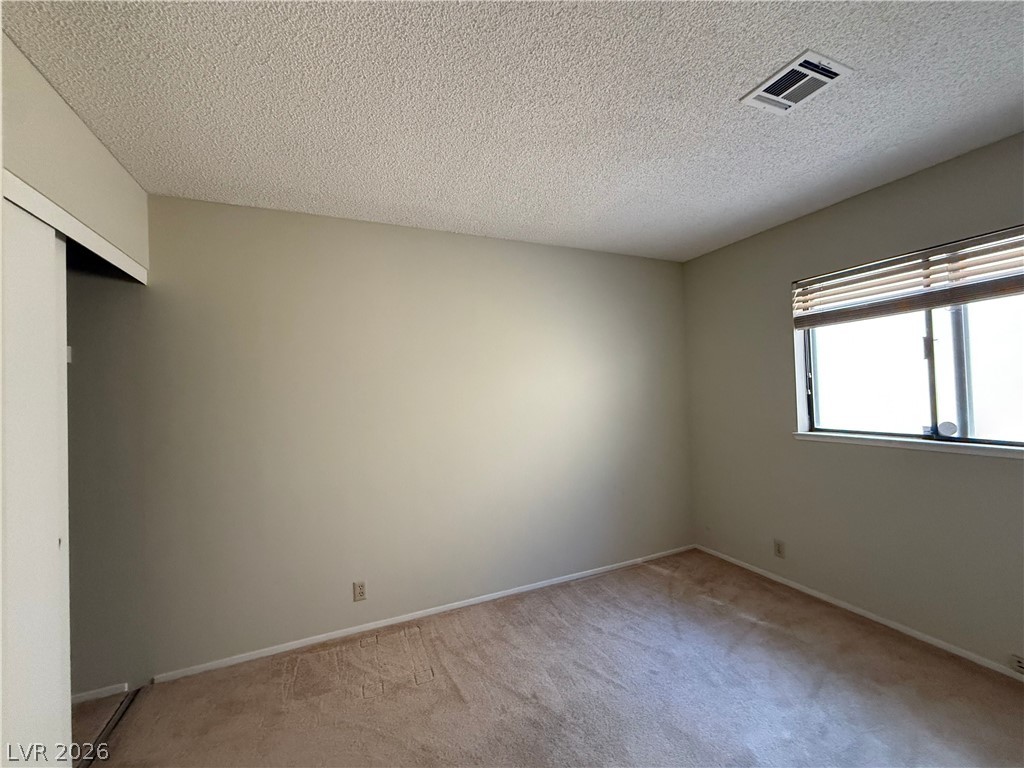 6491 West Viking Road Las Vegas, NV 89103 - Photo 16 of 20 Secondary Bedroom with large closet