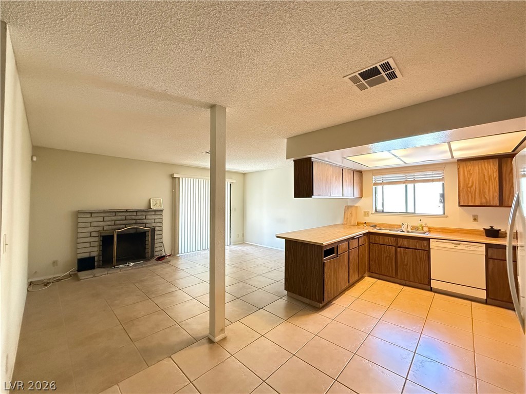 6491 West Viking Road Las Vegas, NV 89103 - Photo 4 of 20 Open kitchen / dining / living room.