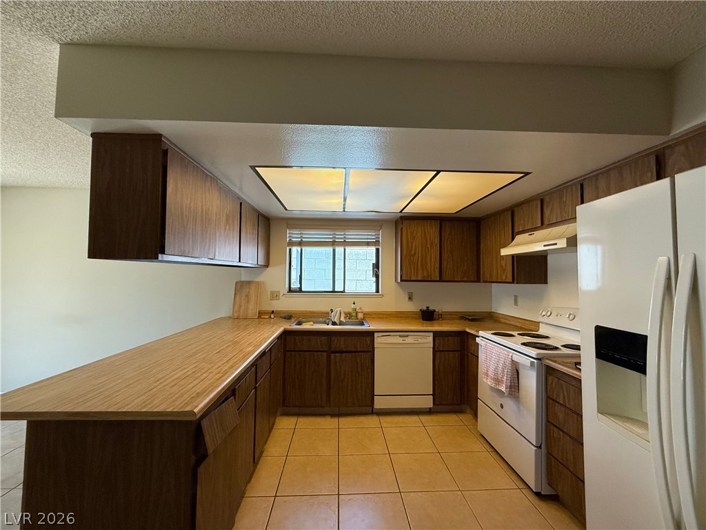 6491 West Viking Road Las Vegas, NV 89103 - Photo 5 of 20 Kitchen - all appliances remain with home