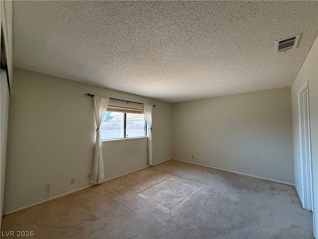 6491 West Viking Road Las Vegas, NV 89103 - Photo 9 of 20 Primary Bedroom facing back of home