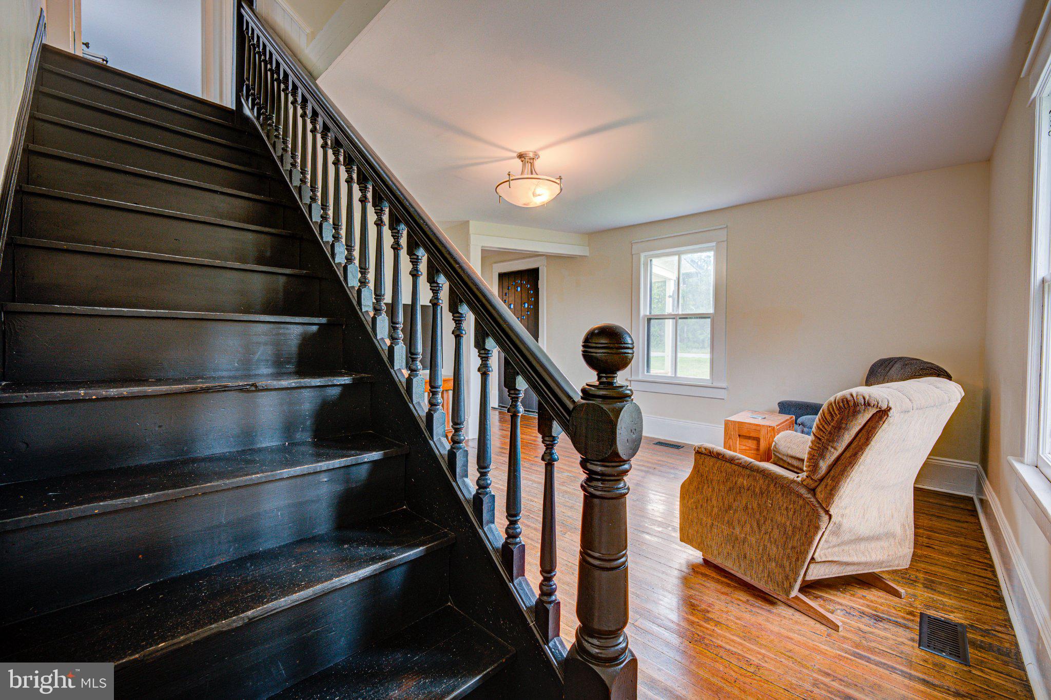 24177 Rapidan Road Mitchells, VA 22729 - Photo 21 of 43 Charming entryway with classic staircase.