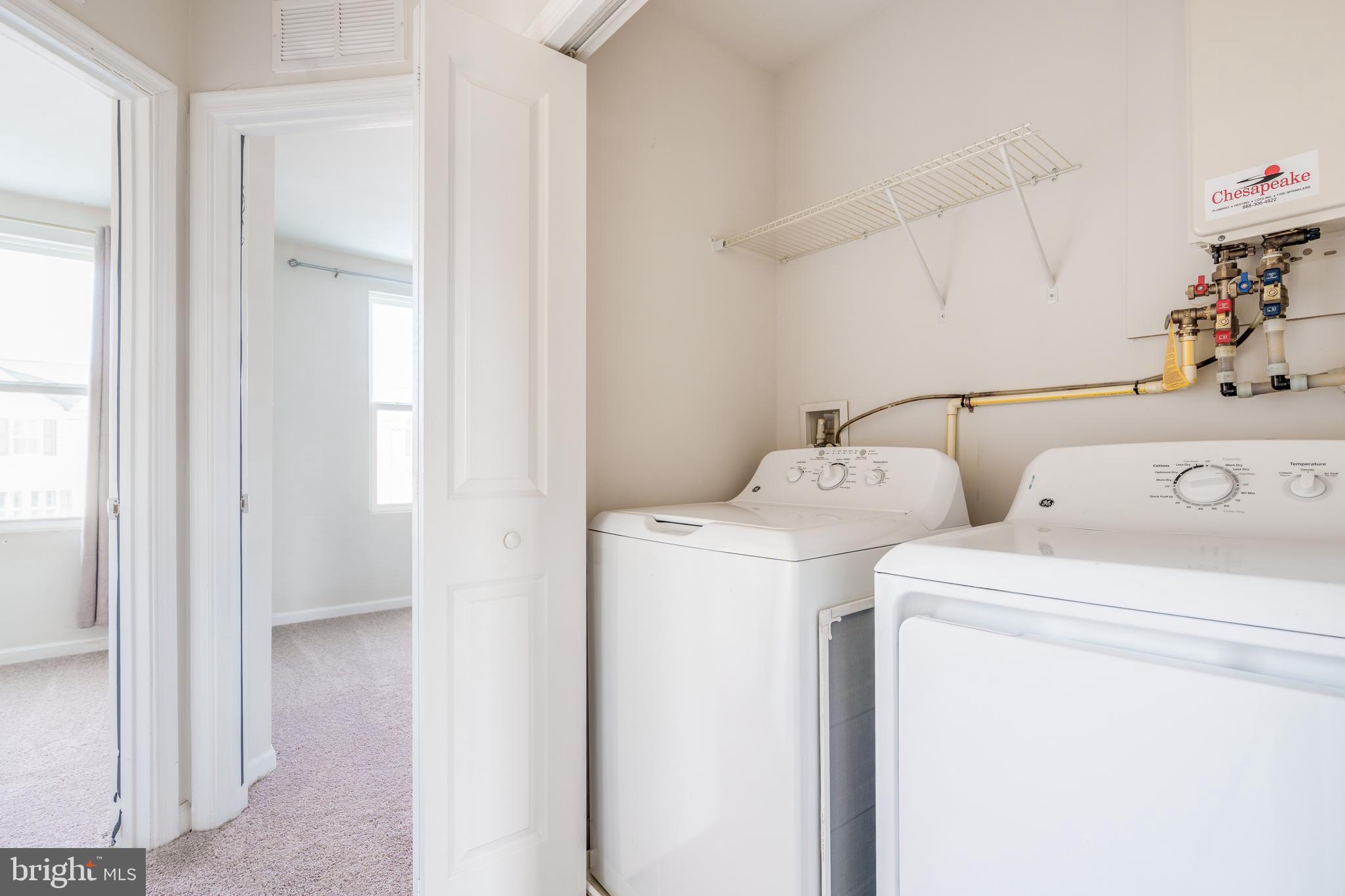 26 Marsh Lane Elkton, MD 21921 - Photo 11 of 13 Laundry closet on upper level