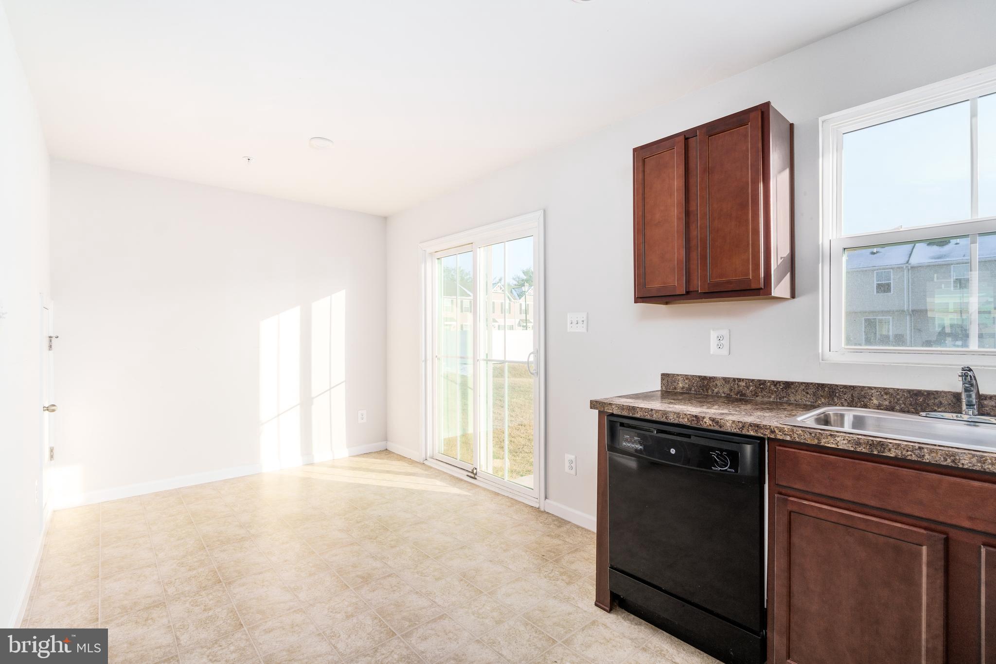 26 Marsh Lane Elkton, MD 21921 - Photo 4 of 13 Dining area with sliding door to the backyard